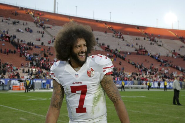 San Francisco 49ers quarterback Colin Kaepernick smiles after the 49ers' 22-21 win over the Los Angeles Rams during an NFL football game Saturday, Dec. 24, 2016, in Los Angeles. (AP Photo/Jae C. Hong)