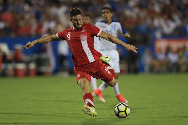 FRISCO, TX - JULY 14:  Lucas Cavallini #9 of Canada takes a shot on goal against Honduras during the 2017 CONCACAF Gold Cup at Toyota Stadium on July 14, 2017 in Frisco, Texas.  (Photo by Ronald Martinez/Getty Images)