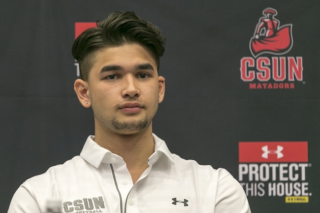 Cal State Northridge newly signed guard Kobe Paras takes questions from the media in Northridge, Calif., Wednesday, May 31, 2017. Paras has transferred from Creighton to Northridge and will be eligible to play basketball for the Matadors in 2018-19. The 6-foot-6 guard from Manila, Philippines, returns to Los Angeles, where he played at Cathedral High before transferring to Middlebrooks Academy for his senior year. (AP Photo/Damian Dovarganes)