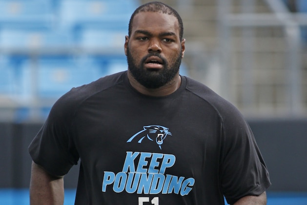Carolina Panthers' Michael Oher warms up before an NFL football game in Charlotte, N.C., Saturday, Aug. 22, 2015. (AP Photo/Bob Leverone)