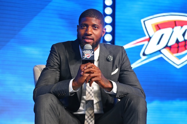 OKLAHOMA CITY, OK - JULY 12:  Paul George #13 of the Oklahoma City Thunder speaks to fans and media during a media event on July 12, 2017 at the Jones Assembly Hall in Oklahoma City, Oklahoma. NOTE TO USER: User expressly acknowledges and agrees that, by downloading and or using this Photograph, user is consenting to the terms and conditions of the Getty Images License Agreement. Mandatory Copyright Notice: Copyright 2017 NBAE (Photo by Layne Murdoch/NBAE via Getty Images)