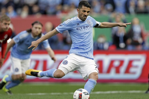 New York City FC forward David Villa scores a penalty kick goal against the Toronto FC during the first half of an MLS soccer game at Yankee Stadium on Sunday, March 13, 2016, in New York. (AP Photo/Adam Hunger)