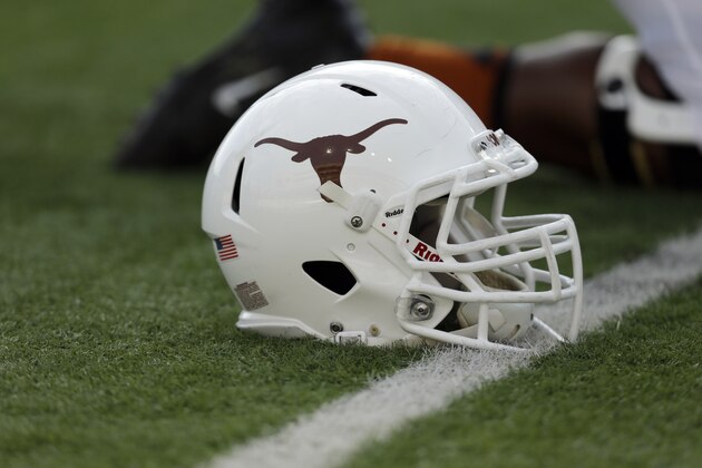 A Texas football helmet is seen during the team's spring football game, Saturday, March 30, 2013, in Austin, Texas. (AP Photo/Eric Gay) A Texas football helmet is seen during the team's spring football game, Saturday, March 30, 2013, in Austin, Texas. (AP Photo/Eric Gay)