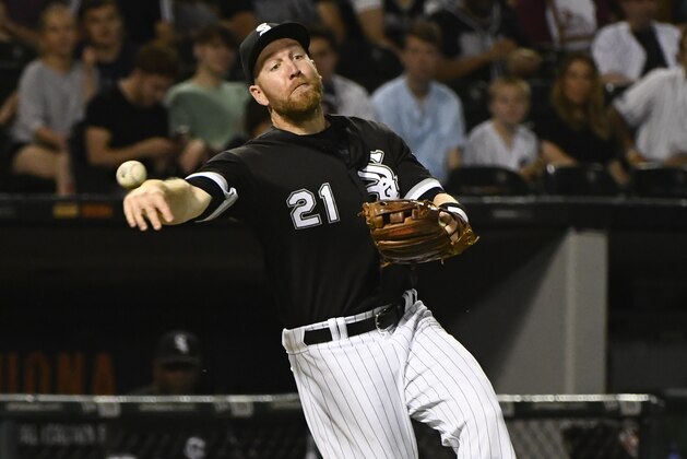 Chicago White Sox third baseman Todd Frazier (21) throws a Texas Rangers batter out at first base during the sixth inning of a baseball game in Chicago on Friday, June 30, 2017. (AP Photo/Matt Marton)
