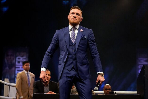 LONDON, ENGLAND - JULY 14:  Conor McGregor reacts to the crowd during the Floyd Mayweather Jr. v Conor McGregor World Press Tour event at SSE Arena on July 14, 2017 in London, England. (Photo by Jeff Bottari/Zuffa LLC/Zuffa LLC via Getty Images)