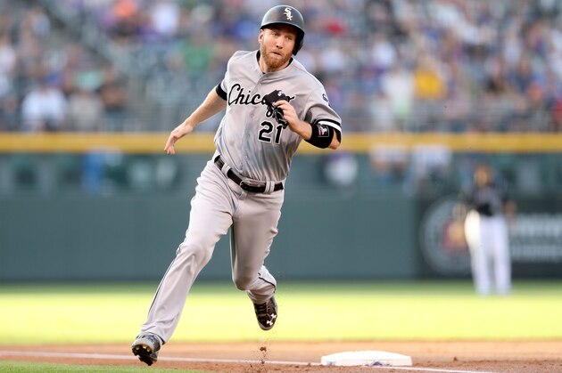 DENVER, CO - JULY 08:  Todd Frazier #21 of the Chicago White Sox scores on a Yolmer Sanchez 2 RBI triple in the first inning against the Colorado Rockies in the first inning at Coors Field on July 8, 2017 in Denver, Colorado.  (Photo by Matthew Stockman/Getty Images)