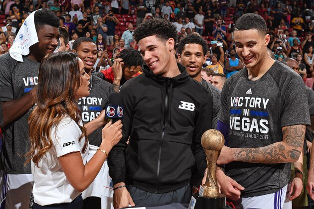 LAS VEGAS, NV - JULY 17:  Lonzo Ball #2 and Kyle Kuzma #0 of the Los Angeles Lakers speak to a reporter after the game against the Portland Trailblazers during the 2017 Summer League Finals on July 17, 2017 at the Thomas & Mack Center in Las Vegas, Nevada. NOTE TO USER: User expressly acknowledges and agrees that, by downloading and/or using this Photograph, user is consenting to the terms and conditions of the Getty Images License Agreement. Mandatory Copyright Notice: Copyright 2017 NBAE (Photo by Garrett Ellwood/NBAE via Getty Images)
