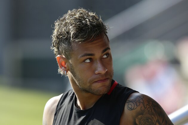 FC Barcelona's Neymar attends a training session at the Sports Center FC Barcelona Joan Gamper in Sant Joan Despi, Spain, Monday, July 17, 2017. (AP Photo/Manu Fernandez) FC Barcelona's Neymar attends a training session at the Sports Center FC Barcelona Joan Gamper in Sant Joan Despi, Spain, Monday, July 17, 2017. (AP Photo/Manu Fernandez)