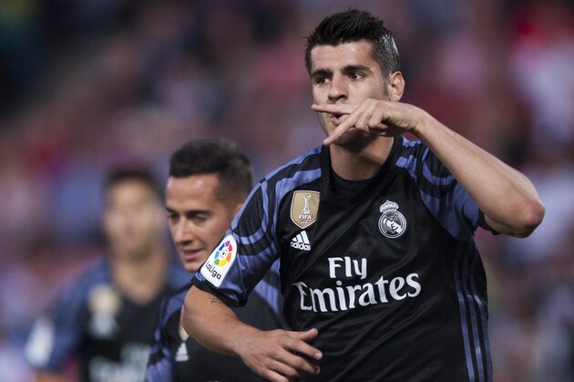 Real Madrid's Alvaro Morata celebrates scoring his goal against Granada during a Spanish La Liga soccer match between Granada and Real Madrid in Granada, Spain, Saturday May 6, 2017. (AP Photo/Daniel Tejedor)