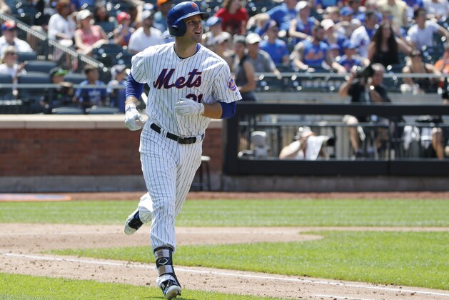New York Mets' Lucas Duda trots up the first base line after hitting a solo home run during the fourth inning of a baseball game against the Colorado Rockies, Sunday, July 16, 2017, in New York. (AP Photo/Kathy Willens)