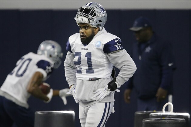 Dallas Cowboys running back Ezekiel Elliott (21) walks the field during an indoor NFL football practice at the team's headquarters in Frisco, Texas, Wednesday, Jan. 11, 2017. The Cowboys face the Green Bay Packers in the NFL playoffs this Sunday. (AP Photo/LM Otero)