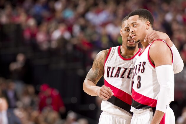 PORTLAND, OR - FEBRUARY 13: Damian Lillard #0 talks with C.J. McCollum #3 of the Portland Trail Blazers during the game against the Atlanta Hawks on February 13, 2017 at the Moda Center in Portland, Oregon. NOTE TO USER: User expressly acknowledges and agrees that, by downloading and or using this Photograph, user is consenting to the terms and conditions of the Getty Images License Agreement. Mandatory Copyright Notice: Copyright 2017 NBAE (Photo by Cameron Browne/NBAE via Getty Images)