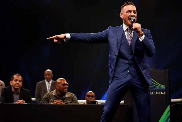 LONDON, ENGLAND - JULY 14:  Conor McGregor reacts to the crowd during the Floyd Mayweather Jr. v Conor McGregor World Press Tour event at SSE Arena on July 14, 2017 in London, England. (Photo by Jeff Bottari/Zuffa LLC/Zuffa LLC via Getty Images)
