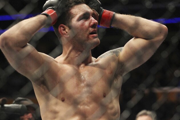 Chris Weidman reacts to his loss to Gerard Mousasi during a middleweight mixed martial arts bout at UFC 210, Saturday, April 8, 2017, in Buffalo, N.Y. (AP Photo/Jeffrey T. Barnes)