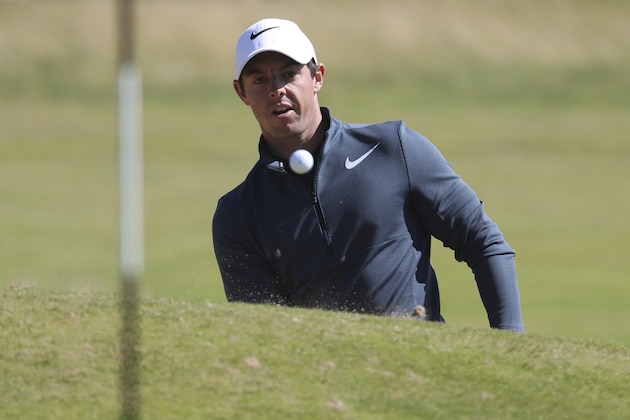 Northern Ireland's Rory McIlroy plays out of a bunker onto the 4th green during the first round of the British Open Golf Championship, at Royal Birkdale, Southport, England Thursday, July 20, 2017. (AP Photo/Peter Morrison) Northern Ireland's Rory McIlroy plays out of a bunker onto the 4th green during the first round of the British Open Golf Championship, at Royal Birkdale, Southport, England Thursday, July 20, 2017. (AP Photo/Peter Morrison)