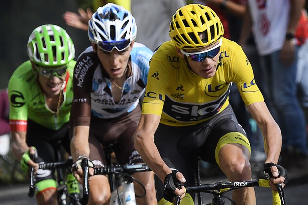 (From R) Great Britain's Christopher Froome, wearing the overall leader's yellow jersey, France's Romain Bardet and Colombia's Rigoberto Uran climb the Col d'Izoard during the 179,5 km eighteenth stage of the 104th edition of the Tour de France cycling race on July 20, 2017 between Briancon and Izoard, French Alps. / AFP PHOTO / Lionel BONAVENTURE        (Photo credit should read LIONEL BONAVENTURE/AFP/Getty Images)