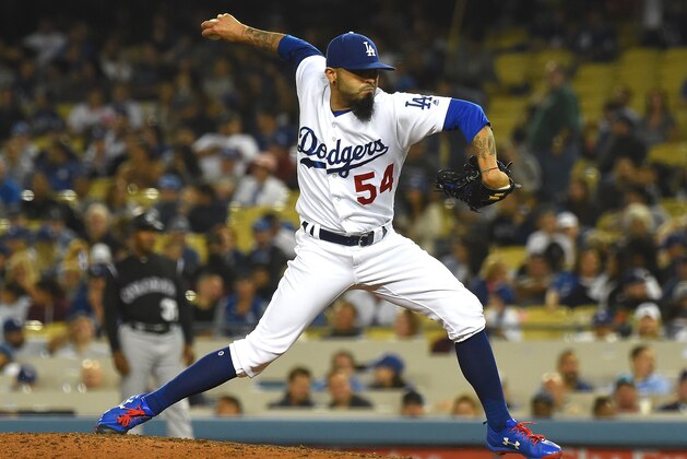 LOS ANGELES, CA - JUNE 23:  Sergio Romo #54 of the Los Angeles Dodgers in the ninth inning of the game against the Colorado Rockies at Dodger Stadium on June 23, 2017 in Los Angeles, California.  (Photo by Jayne Kamin-Oncea/Getty Images)