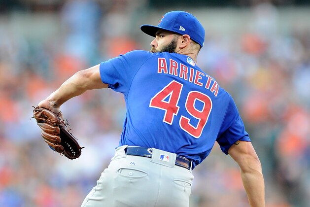 BALTIMORE, MD - JULY 15:  Jake Arrieta #49 of the Chicago Cubs pitches against the Baltimore Orioles at Oriole Park at Camden Yards on July 15, 2017 in Baltimore, Maryland.  (Photo by G Fiume/Getty Images)