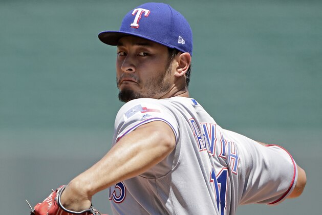 Texas Rangers starting pitcher Yu Darvish throws during the second inning of a baseball game against the Kansas City Royals, Sunday, July 16, 2017, in Kansas City, Mo. (AP Photo/Charlie Riedel)