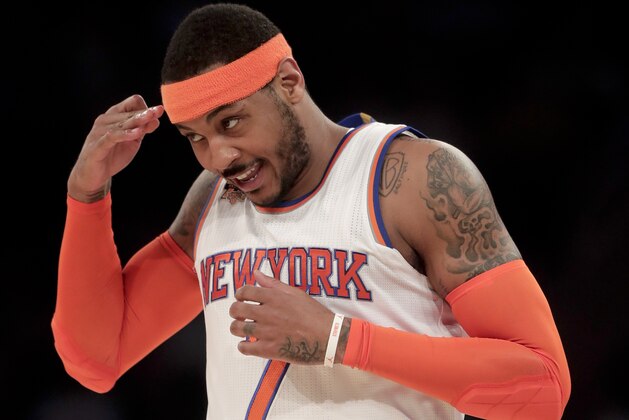 New York Knicks forward Carmelo Anthony (7) reacts after hitting a 3-point shot against the Washington Wizards during the first quarter of an NBA basketball game, Thursday, April 6, 2017, in New York. (AP Photo/Julie Jacobson) New York Knicks forward Carmelo Anthony (7) reacts after hitting a 3-point shot against the Washington Wizards during the first quarter of an NBA basketball game, Thursday, April 6, 2017, in New York. (AP Photo/Julie Jacobson)