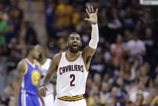 Cleveland Cavaliers guard Kyrie Irving reacts in the first half against the Cleveland Cavaliers in Game 4 of basketball's NBA Finals in Cleveland, Friday, June 9, 2017. (AP Photo/Tony Dejak)