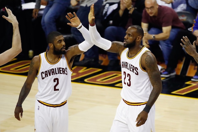 CLEVELAND, OH - JUNE 09:  Kyrie Irving #2 and LeBron James #23 of the Cleveland Cavaliers celebrate after a play in the first quarter against the Golden State Warriors in Game 4 of the 2017 NBA Finals at Quicken Loans Arena on June 9, 2017 in Cleveland, Ohio. NOTE TO USER: User expressly acknowledges and agrees that, by downloading and or using this photograph, User is consenting to the terms and conditions of the Getty Images License Agreement.  (Photo by Gregory Shamus/Getty Images)