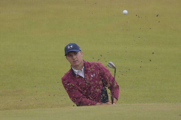 Jordan Spieth of the United States plays out of the bunker on the 14th hole during the second round of the British Open Golf Championship, at Royal Birkdale, Southport, England, Friday July 21, 2017. (AP Photo/Alastair Grant)