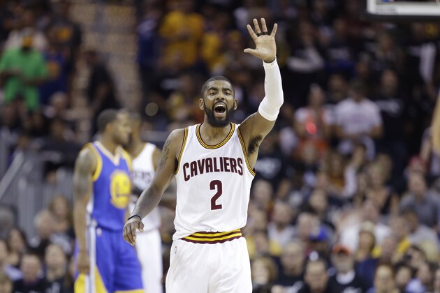 Cleveland Cavaliers guard Kyrie Irving reacts during play against the Golden State Warriors in the first half of Game 4 of basketball's NBA Finals in Cleveland, Friday, June 9, 2017. (AP Photo/Tony Dejak)