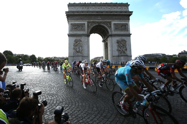 PARIS, FRANCE - JULY 24: Riders of the Tour pass the Arc de Triomphe during stage 21, last stage of the Tour de France 2016 between Chantilly and the Champs Elysees Avenue on July 24, 2016 in Paris, France. (Photo by Jean Catuffe/Getty Images) PARIS, FRANCE - JULY 24: Riders of the Tour pass the Arc de Triomphe during stage 21, last stage of the Tour de France 2016 between Chantilly and the Champs Elysees Avenue on July 24, 2016 in Paris, France. (Photo by Jean Catuffe/Getty Images)