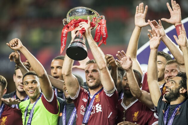 HONG KONG, HONG KONG - JULY 22: Players of Liverpool FC celebrate with the trophy during the Premier League Asia Trophy prize presentation at Hong Kong Stadium on July 22, 2017 in Hong Kong, Hong Kong. (Photo by Victor Fraile/Getty Images)