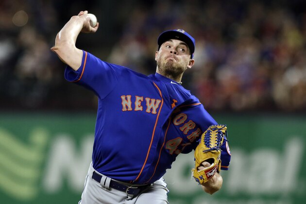 New York Mets relief pitcher Addison Reed (43) throws to the Texas Rangers in the ninth inning of a baseball game, Wednesday, June 7, 2017, in Arlington, Texas. (AP Photo/Tony Gutierrez)