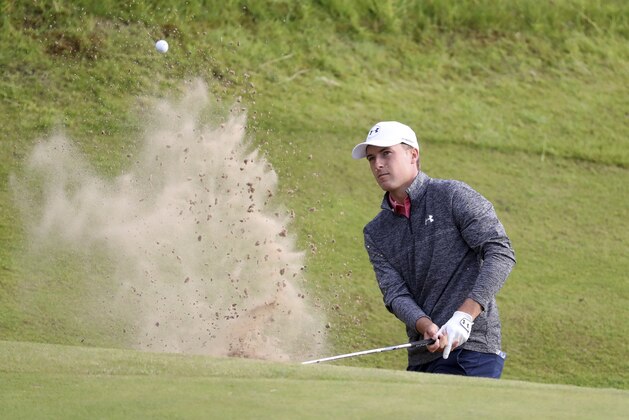 Jordan Spieth of the United States plays out of a bunker on the 17th hole during the third round of the British Open Golf Championship, at Royal Birkdale, Southport, England, Saturday July 22, 2017. (AP Photo/Peter Morrison)
