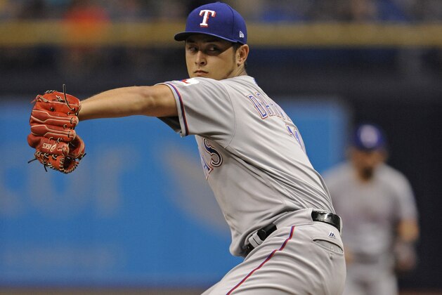 Texas Rangers starter Yu Darvish pitches against the Tampa Bay Rays during the first inning of a baseball game Friday, July 21, 2017, in St. Petersburg, Fla. (AP Photo/Steve Nesius) Texas Rangers starter Yu Darvish pitches against the Tampa Bay Rays during the first inning of a baseball game Friday, July 21, 2017, in St. Petersburg, Fla. (AP Photo/Steve Nesius)