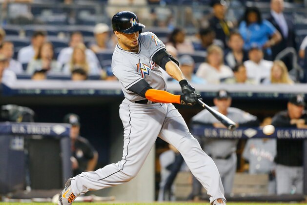 NEW YORK, NY - JUNE 18: Giancarlo Stanton #27 of the Miami Marlins connects on a fourth inning base hit against the New York Yankees at Yankee Stadium on June 18, 2015 in the Bronx borough of New York City. The Yankees defeated the Marlins 9-4. (Photo by Jim McIsaac/Getty Images) NEW YORK, NY - JUNE 18: Giancarlo Stanton #27 of the Miami Marlins connects on a fourth inning base hit against the New York Yankees at Yankee Stadium on June 18, 2015 in the Bronx borough of New York City. The Yankees defeated the Marlins 9-4. (Photo by Jim McIsaac/Getty Images)