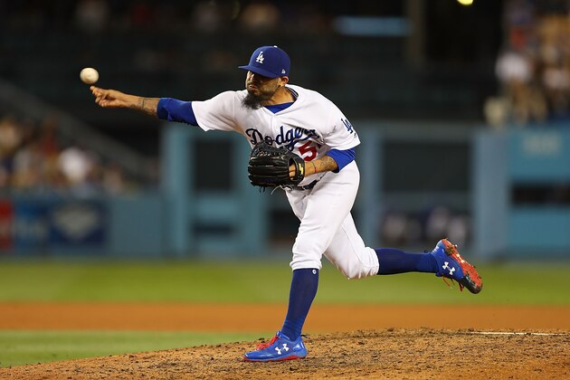LOS ANGELES, CA - JUNE 26:  Sergio Romo #54 of the Los Angeles Dodgers throws a pitch in the 9th inning against the Los Angeles Angels at Dodger Stadium on June 26, 2017 in Los Angeles, California.  (Photo by Joe Scarnici/Getty Images)