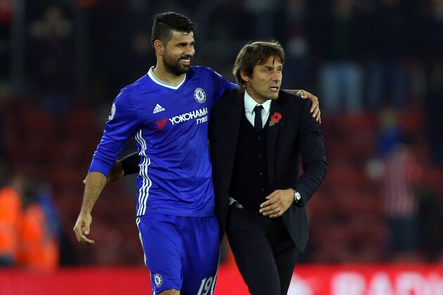 SOUTHAMPTON, ENGLAND - OCTOBER 30: Antonio Conte manager / head coach of Chelsea hugs Diego Costa of Chelsea after the Premier League match between Southampton and Chelsea at St Mary's Stadium on October 30, 2016 in Southampton, England. (Photo by Catherine Ivill - AMA/Getty Images)