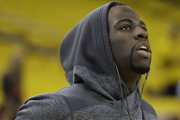 Golden State Warriors forward Draymond Green warms up before Game 5 of basketball's NBA Finals between the Warriors and the Cleveland Cavaliers in Oakland, Calif., Monday, June 12, 2017. (AP Photo/Marcio Jose Sanchez)