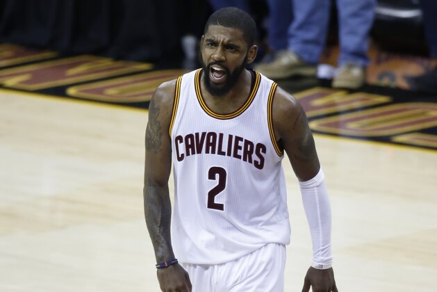Cleveland Cavaliers guard Kyrie Irving yells toward his bench during play against the Golden State Warriors in the second half of Game 4 of basketball's NBA Finals in Cleveland, Friday, June 9, 2017. (AP Photo/Ron Schwane)