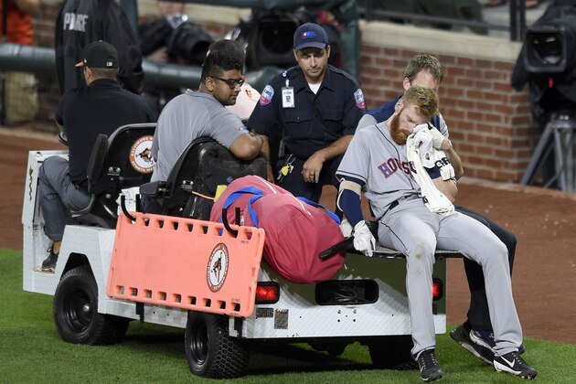 Houston Astros' Colin Moran holds a towel as he is carted off the field after he sustained an injury to his face during his at bat in the sixth inning of a baseball game against the Baltimore Orioles, Saturday, July 22, 2017, in Baltimore. (AP Photo/Nick Wass) Houston Astros' Colin Moran holds a towel as he is carted off the field after he sustained an injury to his face during his at bat in the sixth inning of a baseball game against the Baltimore Orioles, Saturday, July 22, 2017, in Baltimore. (AP Photo/Nick Wass)