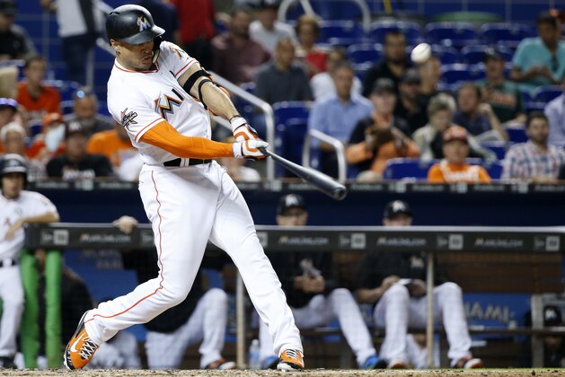 Miami Marlins' Giancarlo Stanton hits a home run during the fifth inning of the team's baseball game against the Philadelphia Phillies, Monday, July 17, 2017, in Miami. Stanton homered twice and Dee Gordon hit an RBI single with two outs in the 10th inning as the Marlins won 6-5. (AP Photo/Wilfredo Lee)