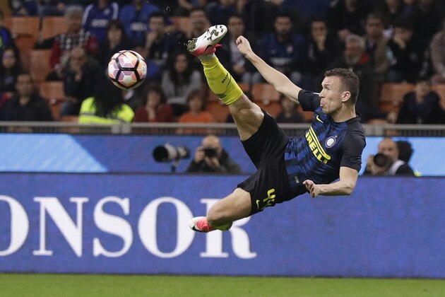 Inter Milan's Ivan Perisic goes for an acrobatic kick during a Serie A soccer match between Inter Milan and Sampdoria, at the San Siro stadium in Milan, Italy, Monday, April 3, 2017. (AP Photo/Antonio Calanni) Inter Milan's Ivan Perisic goes for an acrobatic kick during a Serie A soccer match between Inter Milan and Sampdoria, at the San Siro stadium in Milan, Italy, Monday, April 3, 2017. (AP Photo/Antonio Calanni)