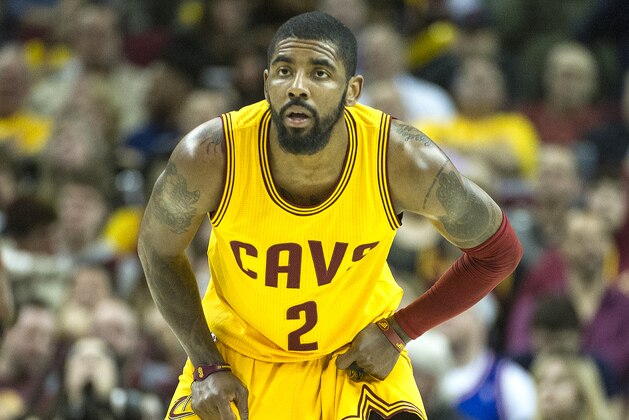 Cleveland Cavaliers' Kyrie Irving (2) waits for the Washington Wizards to bring the ball upcourt during the first half of an NBA basketball game in Cleveland, Saturday, March 25, 2017. (AP Photo/Phil Long)
