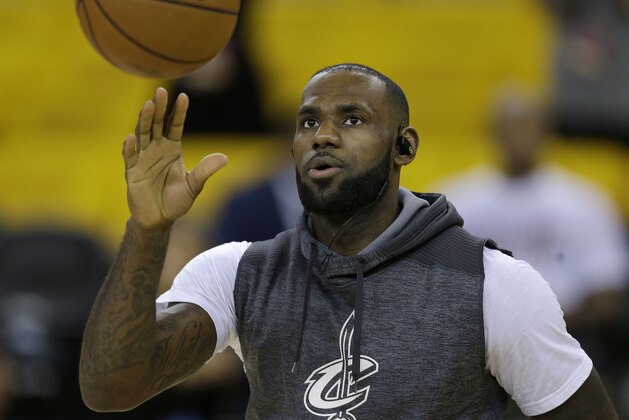 Cleveland Cavaliers forward LeBron James warms up before Game 2 of basketball's NBA Finals against the Golden State Warriors in Oakland, Calif., Sunday, June 4, 2017. (AP Photo/Ben Margot)