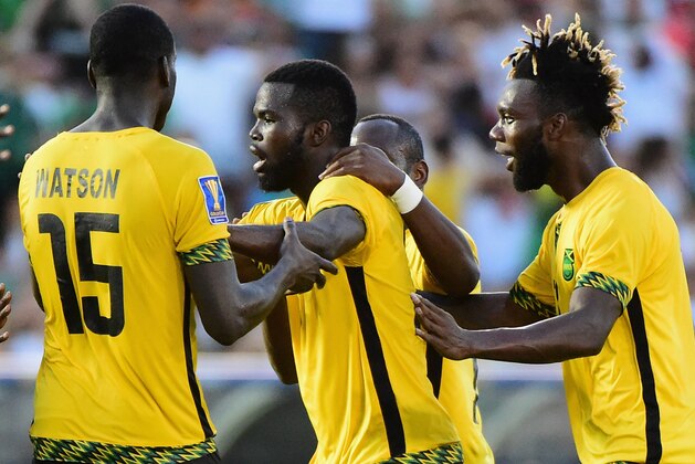 PASADENA, CA - JULY 23:  Kemar Lawrence #20 of Jamaica celebrates his goal with Je-Vaughn Watson #15 and Owayne Gordon #18 to take a 1-0 lead over Mexico during the CONCACAF 2017 semifinal at Rose Bowl on July 23, 2017 in Pasadena, California.  Jamaica won 1-0.  (Photo by Harry How/Getty Images)