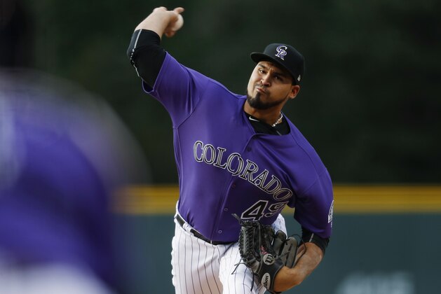 Colorado Rockies starting pitcher Antonio Senzatela delivers a pitch to San Diego Padres' Manuel Margot in the first inning of a baseball game Tuesday, July 18, 2017, in Denver. (AP Photo/David Zalubowski)