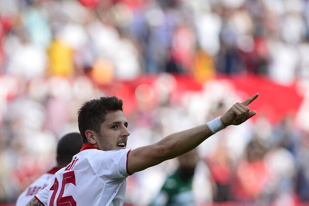Sevilla's Montenegrin forward Stevan Jovetic celebrates after scoring during the Spanish league football match Sevilla FC vs Club Deportivo Leganes SAD at the Ramon Sanchez Pizjuan stadium in Sevilla on March 11, 2017. / AFP PHOTO / CRISTINA QUICLER        (Photo credit should read CRISTINA QUICLER/AFP/Getty Images)