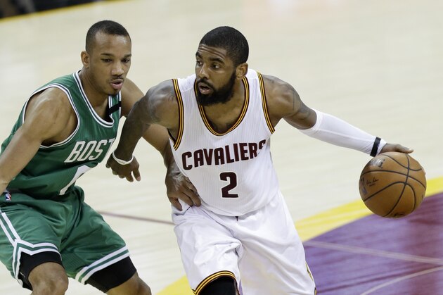 Cleveland Cavaliers' Kyrie Irving (2) drives on Boston Celtics' Avery Bradley (0) during the second half of Game 4 of the NBA basketball Eastern Conference finals, Tuesday, May 23, 2017, in Cleveland. The Cavaliers won 112-99. (AP Photo/Tony Dejak)