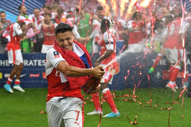 LONDON, ENGLAND - MAY 27:  Alexis Sanchez of Arsenal celebrates victory after the Emirates FA Cup Final between Arsenal and Chelsea at Wembley Stadium on May 27, 2017 in London, England.  (Photo by Laurence Griffiths/Getty Images)