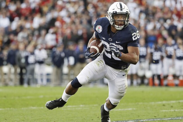 Penn State Nittany Lions running back Saquon Barkley (26) looks for room to run against the USC Trojans during the first half of the Rose Bowl NCAA college football game, Monday, Jan. 2, 2017 in Pasadena, Calif. (AP Photo/Doug Benc) Penn State Nittany Lions running back Saquon Barkley (26) looks for room to run against the USC Trojans during the first half of the Rose Bowl NCAA college football game, Monday, Jan. 2, 2017 in Pasadena, Calif. (AP Photo/Doug Benc)
