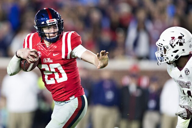 OXFORD, MS - NOVEMBER 26:  Shea Patterson #20 of the Mississippi Rebels runs the ball during a game against the Mississippi State Bulldogs at Vaught-Hemingway Stadium on November 26, 2016 in Oxford, Mississippi.  The Bulldogs defeated the Rebels 55-20.  (Photo by Wesley Hitt/Getty Images)